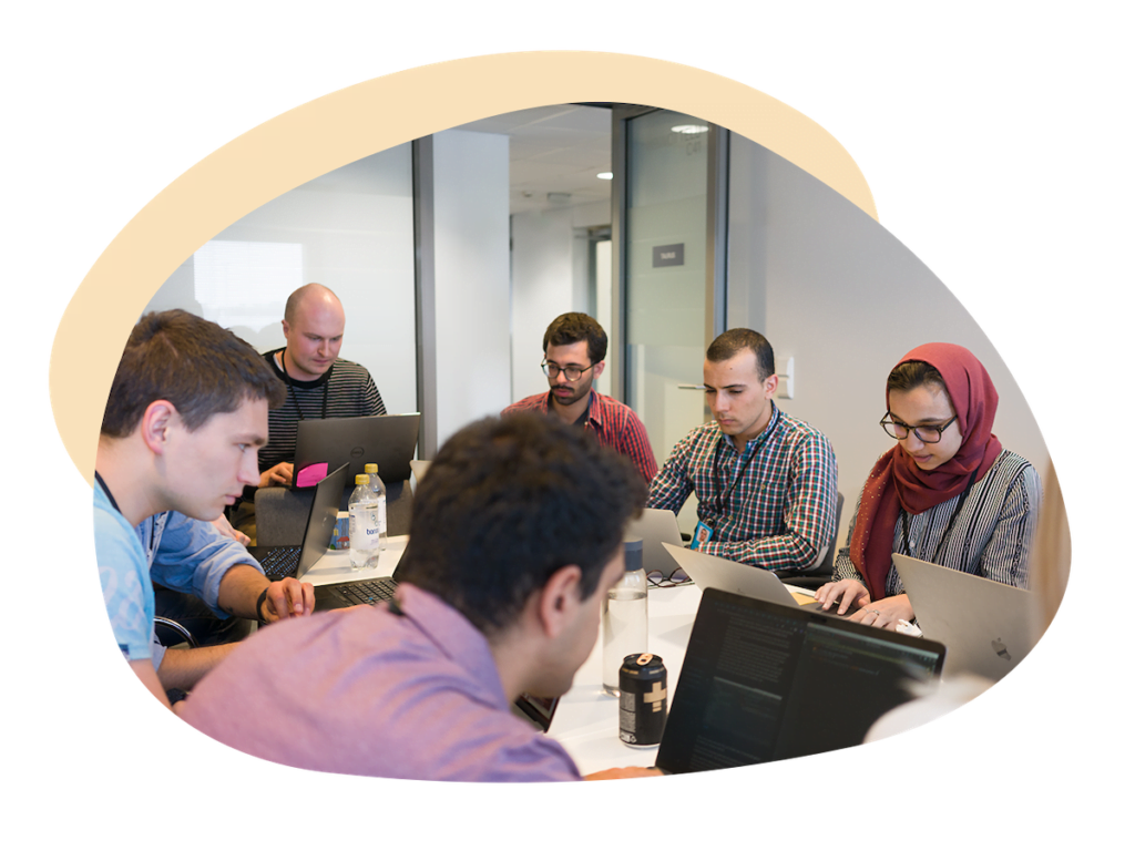 group of people working in an office